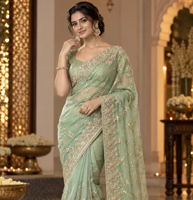 A sage green embroidered lehenga